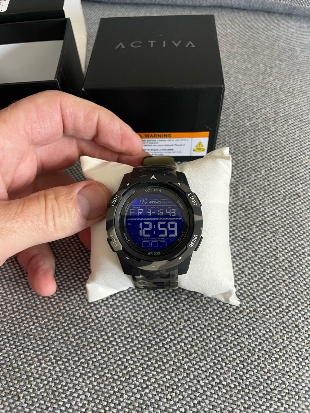 Activa X Terrain digital watch, featuring camouflage pattern and 45mm case.